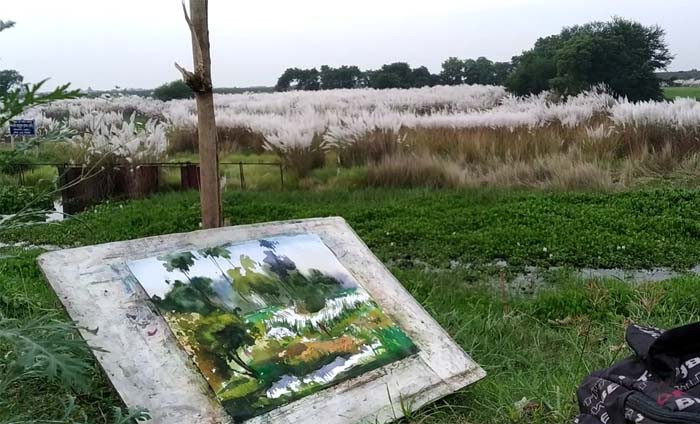 কাশফুলে ছেয়ে গেছে বিস্তৃত প্রান্তর। এর অপরূপ সৌন্দর্য ক্যানভাসে ফুটিয়ে তুলেছেন শিল্পী/ছবি: সরোয়ার হোসেন